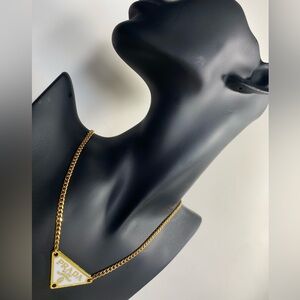 White golden lining Prada charm *golden stainless steel edition*